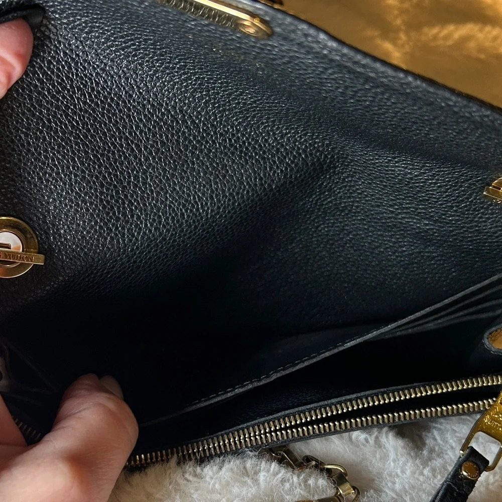 337. Louis Vuitton Saint Germain Pochette in Black Monogram Empreinte leather